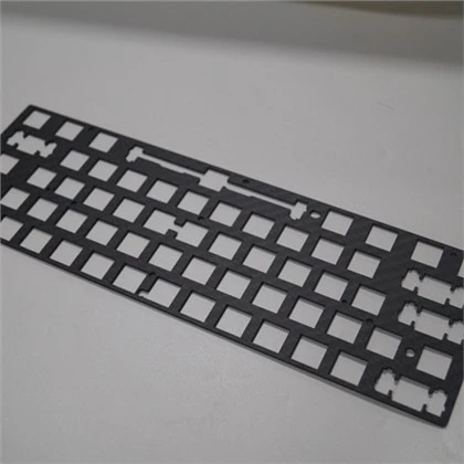 Oglekļa šķiedras tastatūras pozicionēšanas plāksne